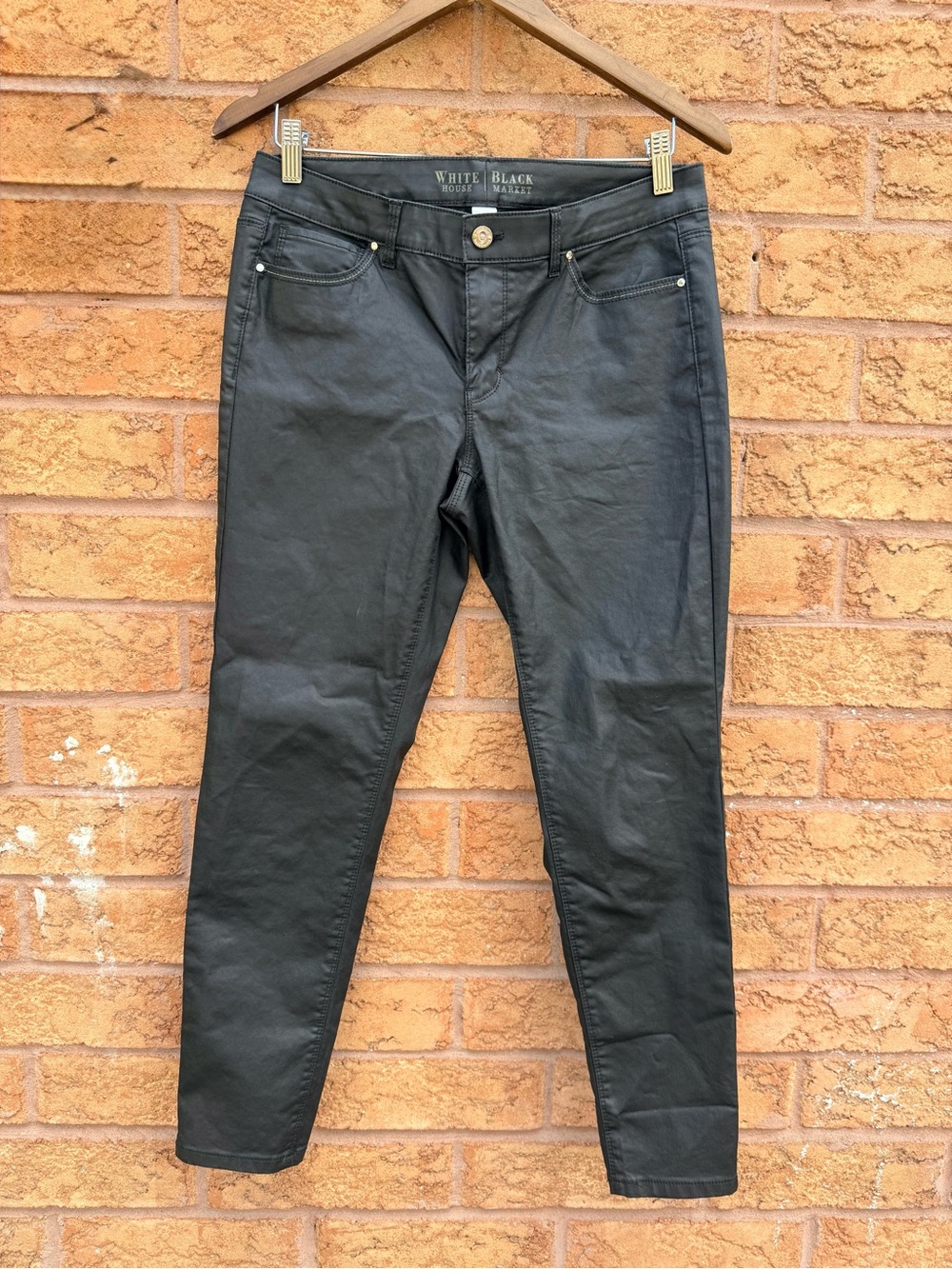 โข White House Black Market Mid Rise Coated Skinny Jeans